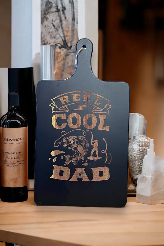 Reel Cool Dad black & Acacia wood Fishing themed cutting board, serving board.